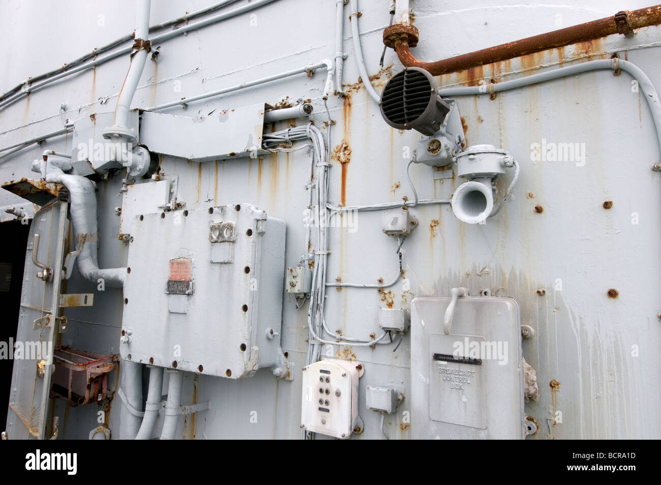 Rusting pipework on decommissioned Navy Ship Stock Photo