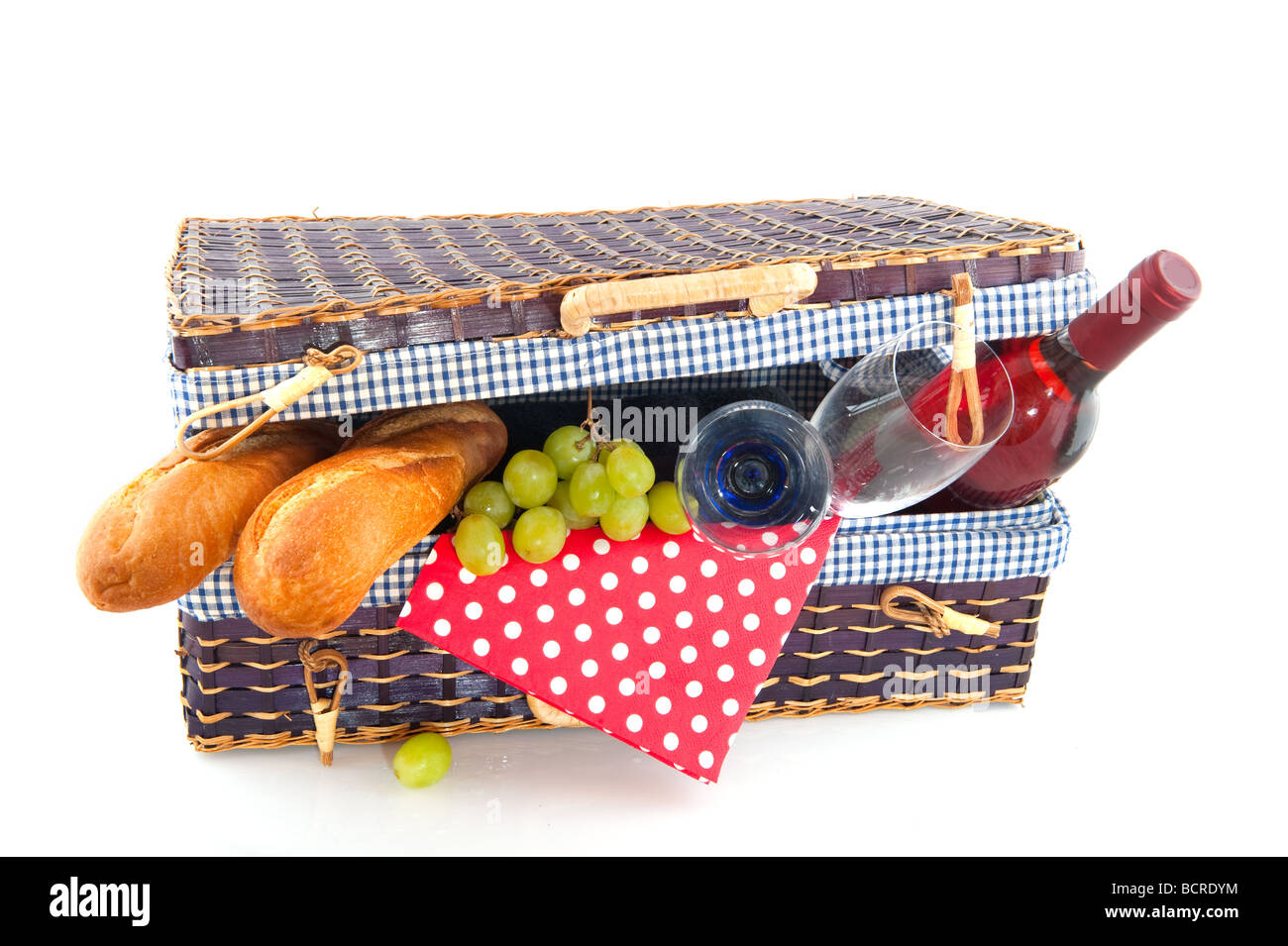 Good filled blue picnic basket for eating outdoor Stock Photo - Alamy