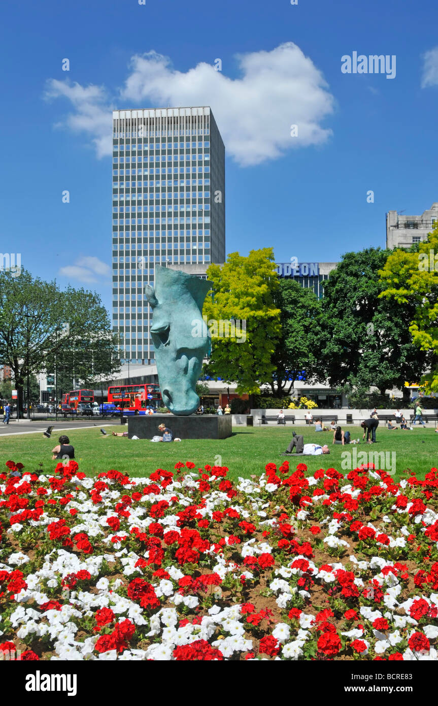 The Marble Arch traffic junction and roundabout with summer flower beds ...