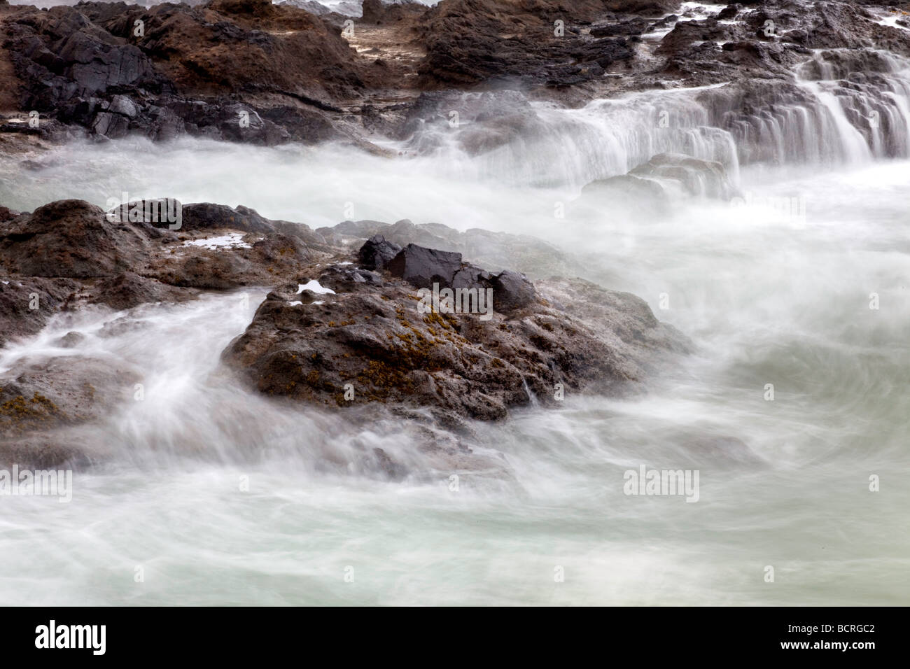A long exposure creates a misty condition at Cape Perpetua Oregon Stock ...