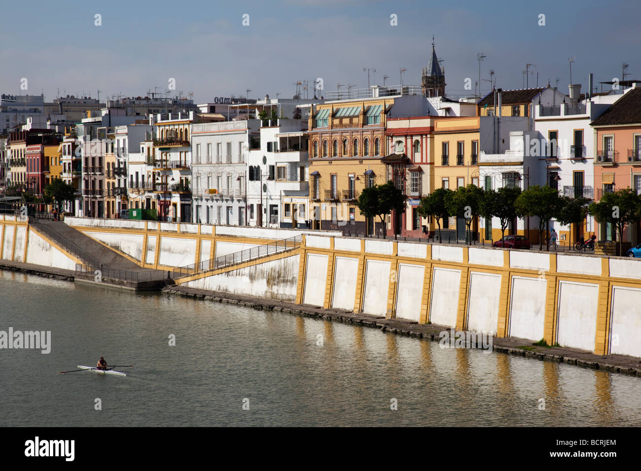 River Guadalquivir with the Sevillan part of town called Triana Stock Photo