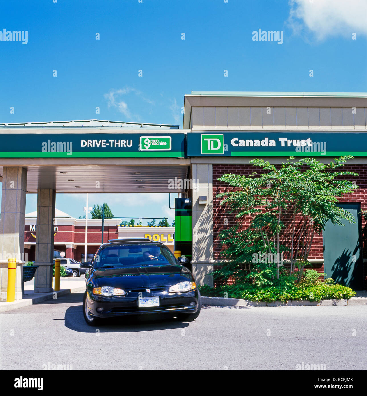 Drive thru bank, drive through bank, drive up ATM customer & car at TD Canada Trust 'Toronto Dominion'  Canadian Bank Fort Erie Canada   KATHY DEWITT Stock Photo