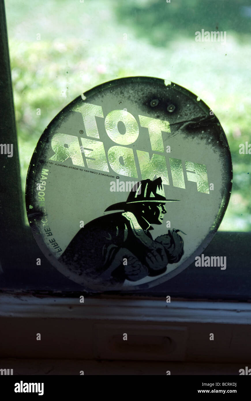A Tot Finder sticker on a window in an officers residence in Nolan Park on historic Governor s Island in the New York harbor Stock Photo