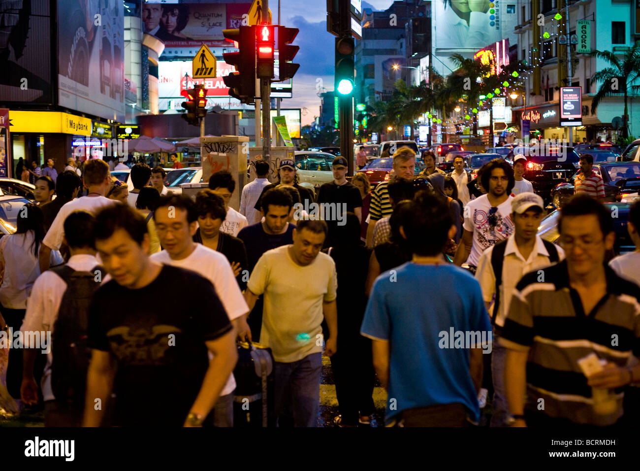 Crowds walk though the Golden Triangle shopping district of Kuala Lumpur, Malaysia Stock Photo