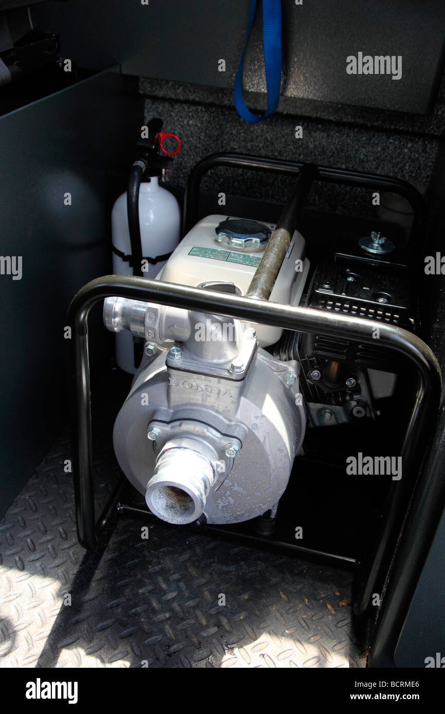 Pump and fire extinguisher on a boat Stock Photo Alamy