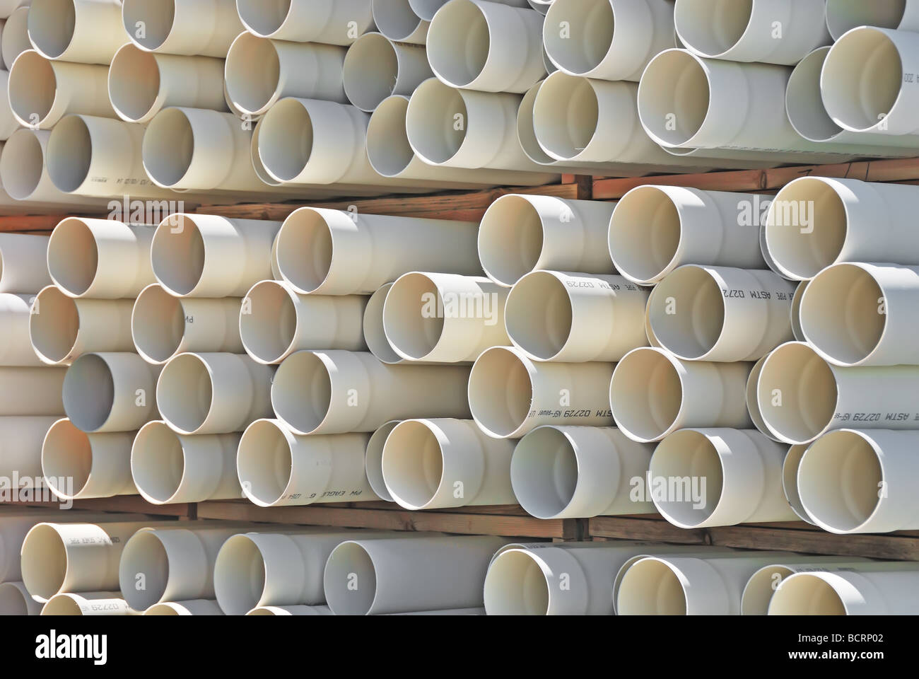 Stacked PVC piping Stock Photo Alamy