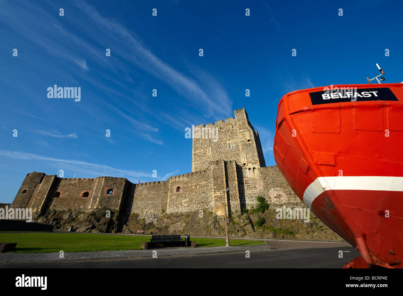 Carrickfergus Castle with the front of a fishing trawler in the