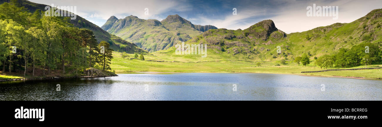 Panoramic Image of Blea Tarn & The Langdale Pikes, Near The Wynrose Pass, Lake District National Park, Cumbria, England, UK Stock Photo