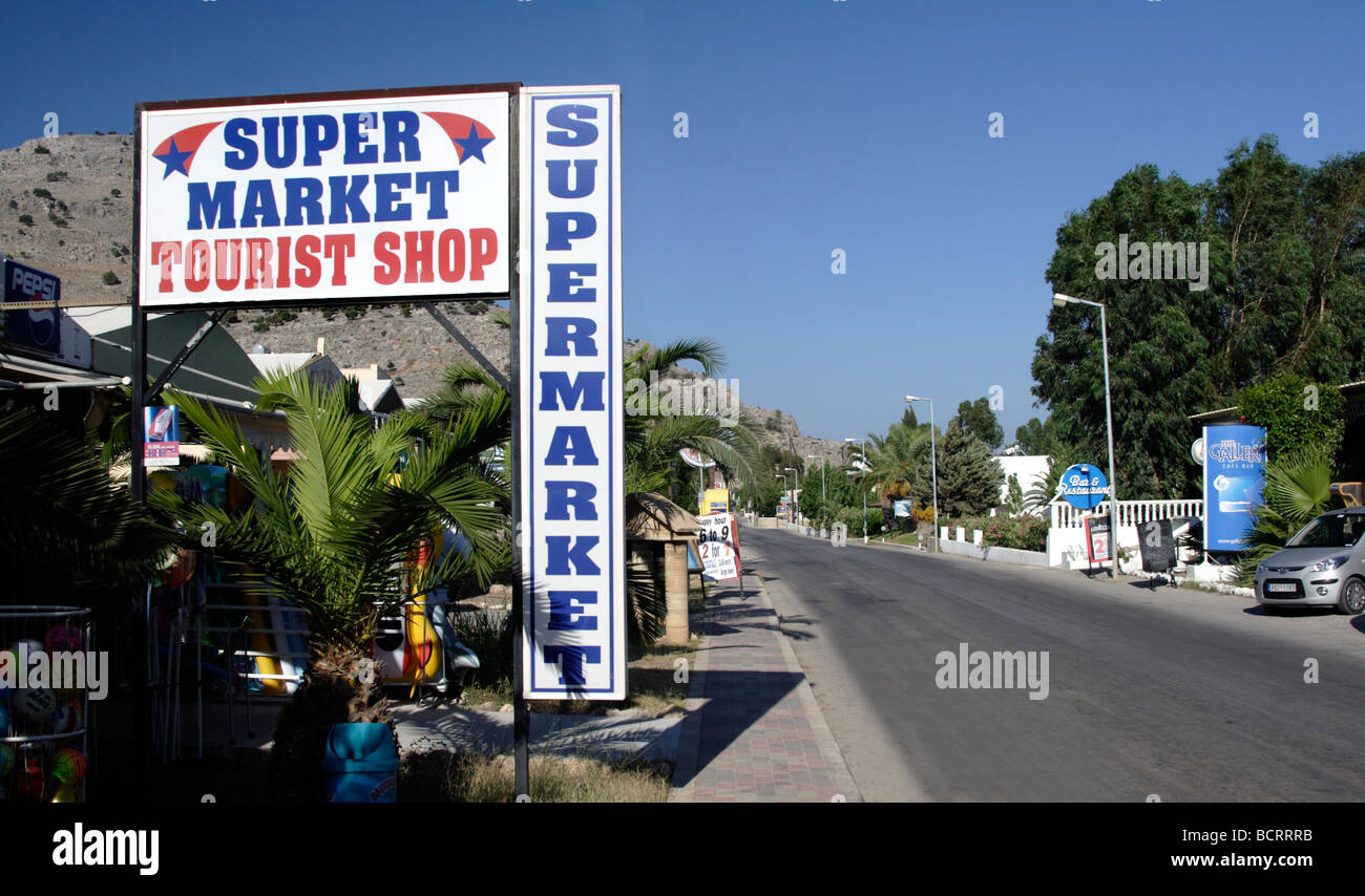 Supermarket and tourist shop sign in Lothiarika Rhodes Dodecanese Islands Greece Stock Photo