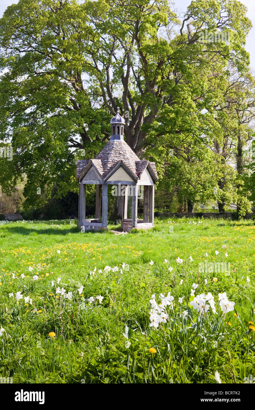 1874 pumphouse on the village green of the Cotswold village of