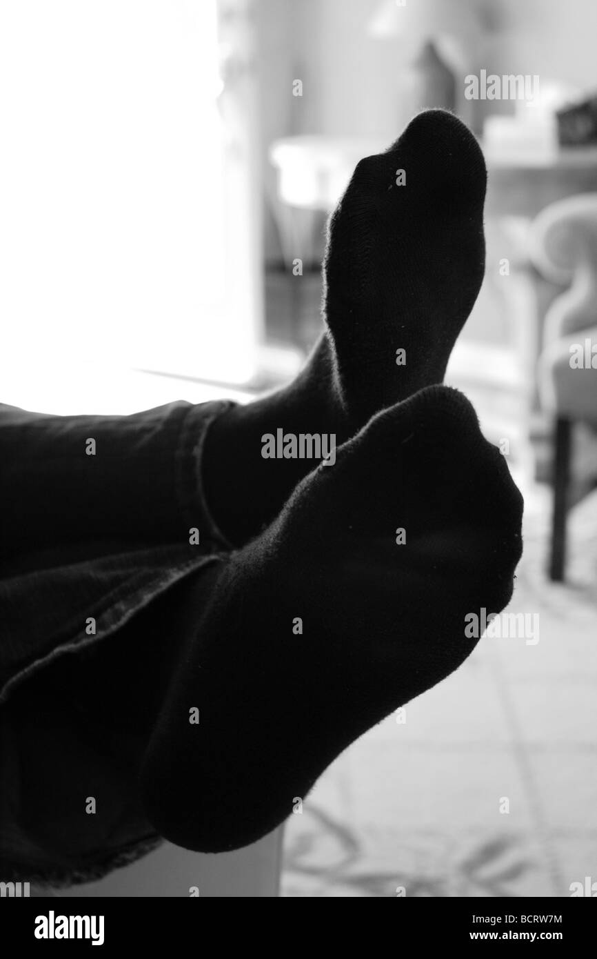 Person with their feet Up Stock Photo Alamy