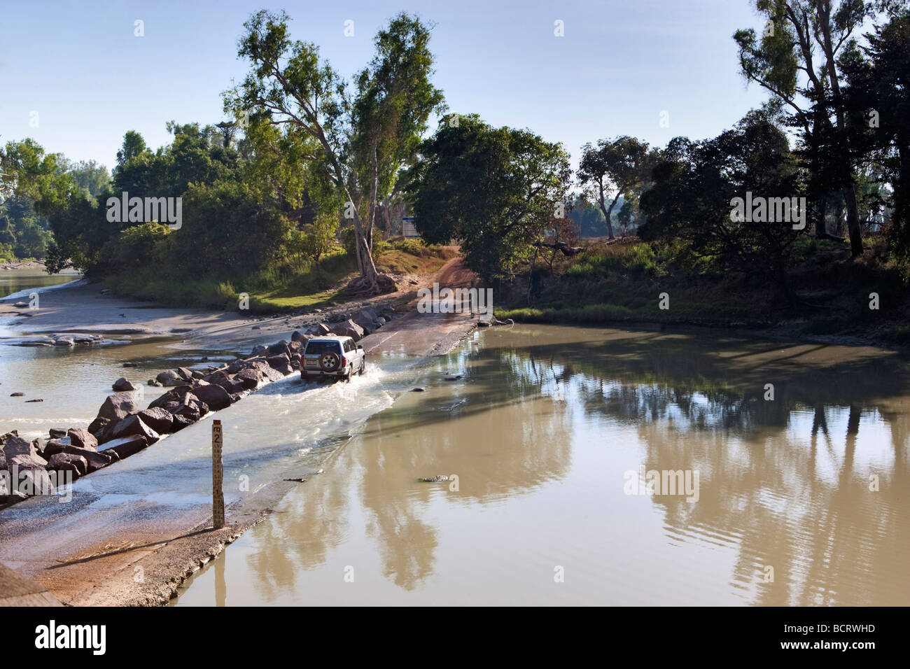 A four wheel drive crossing the East Alligator River at Cahill's