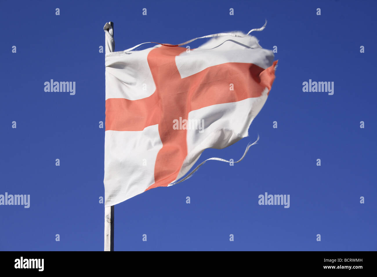 Red, White and Blue tattered St George cross flag Stock Photo