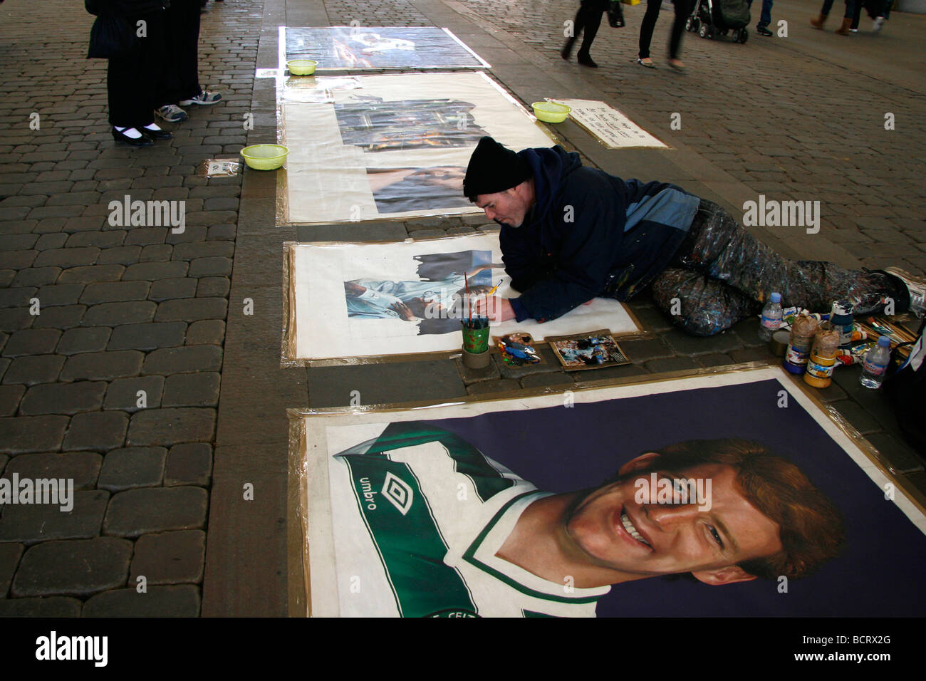 Artist working in the city centre, Manchester UK Stock Photo Alamy