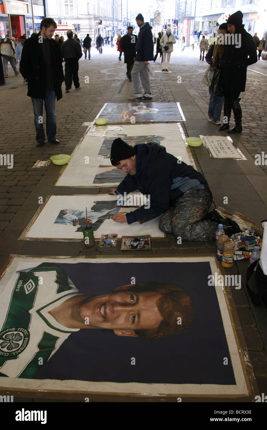 Artist working in the city centre, Manchester UK Stock Photo Alamy