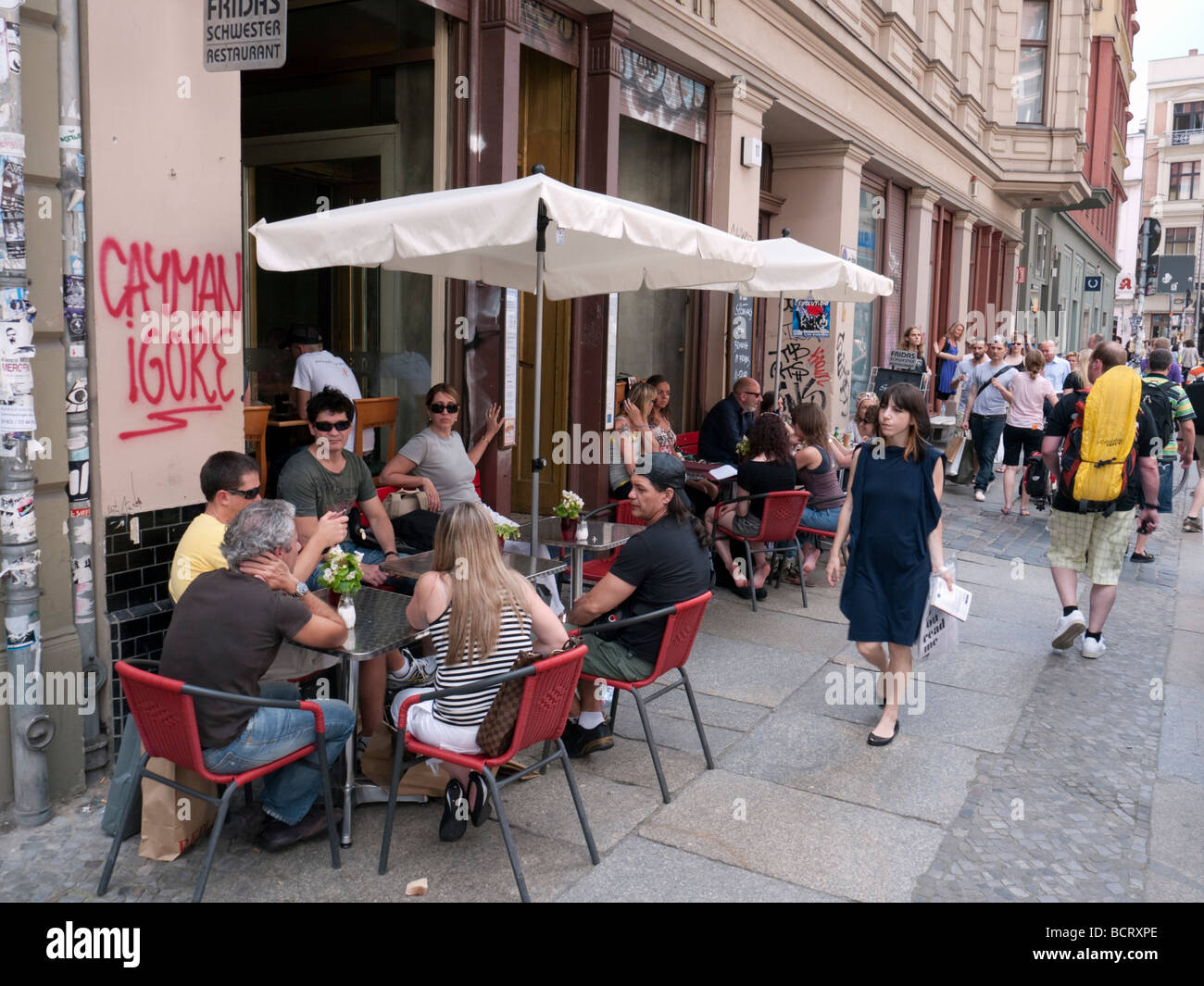 Trendy street cafe and restaurant on bohemian Neue Schonhauser Allee  in Mitte Berlin Germany Stock Photo
