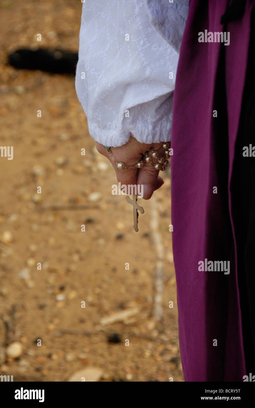 Woman holding crucifix in hand hi-res stock photography and images - Alamy