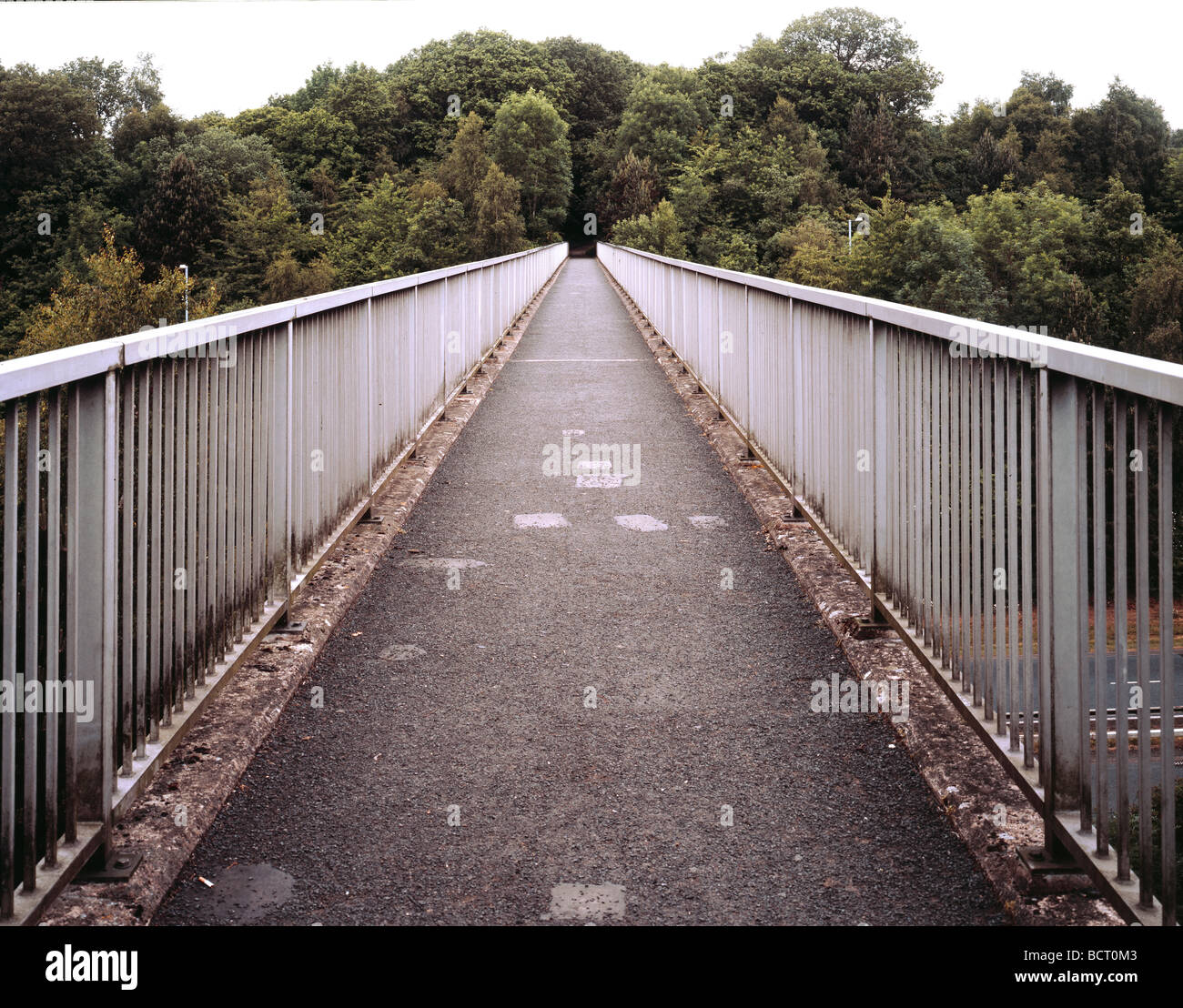 A foot bridge over a main road in the Worcestershire town of Redditch England UK Stock Photo