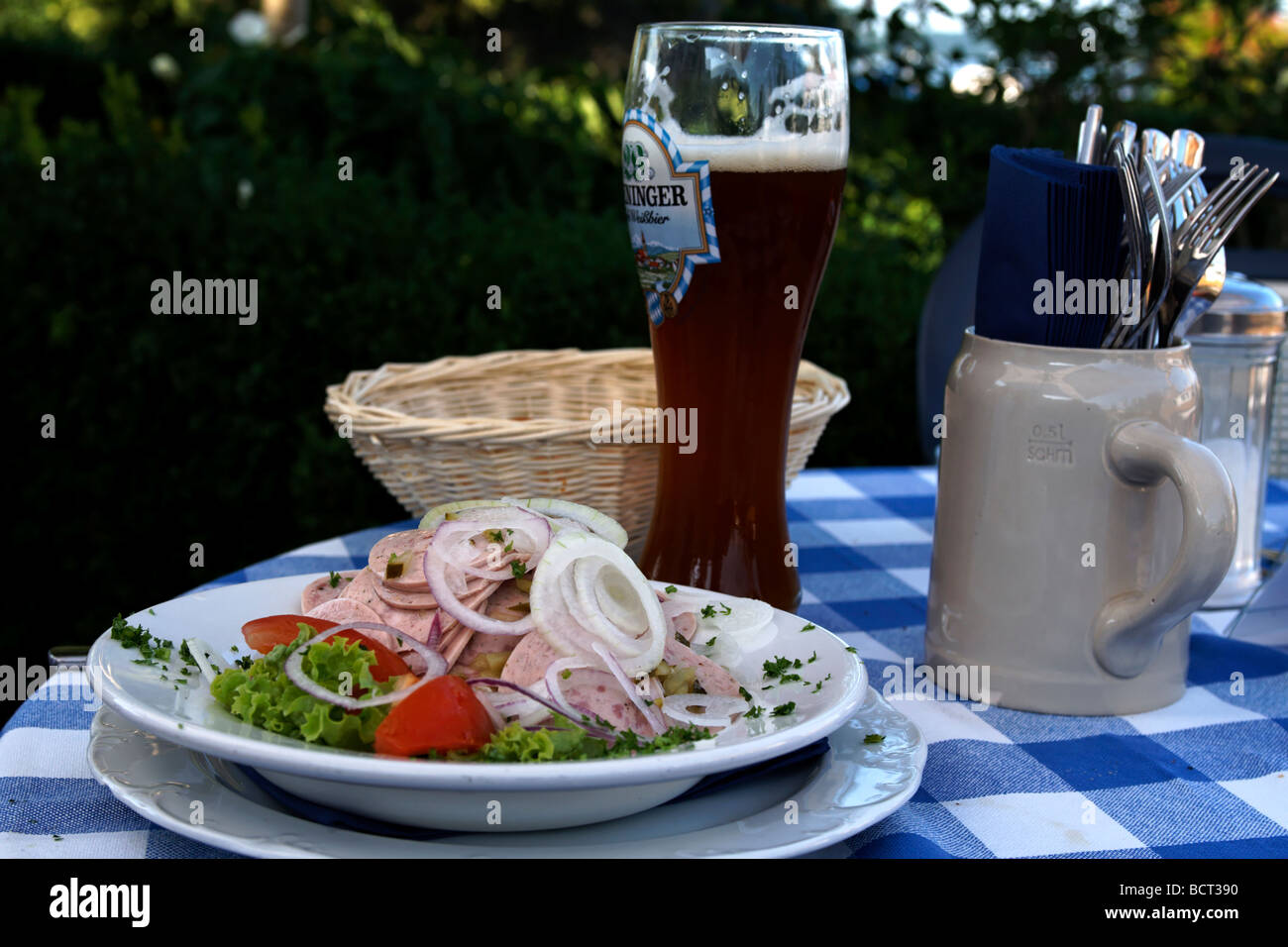 Special Bavarian Dish Wurst Salad and Dark Weiss Beer Germany Stock Photo