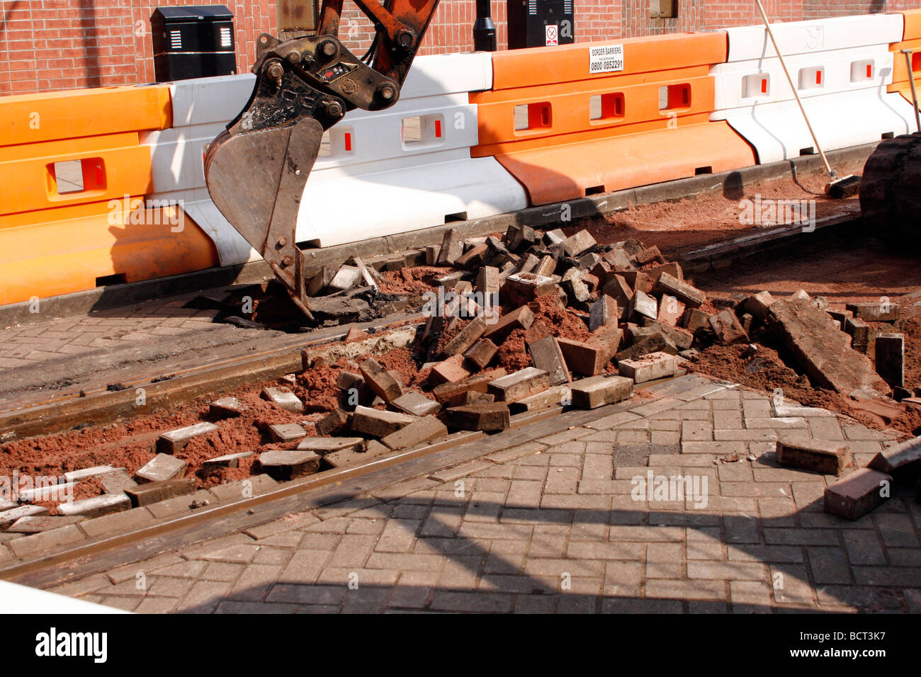 Repairing the metro rail track in Manchester city centre, England UK