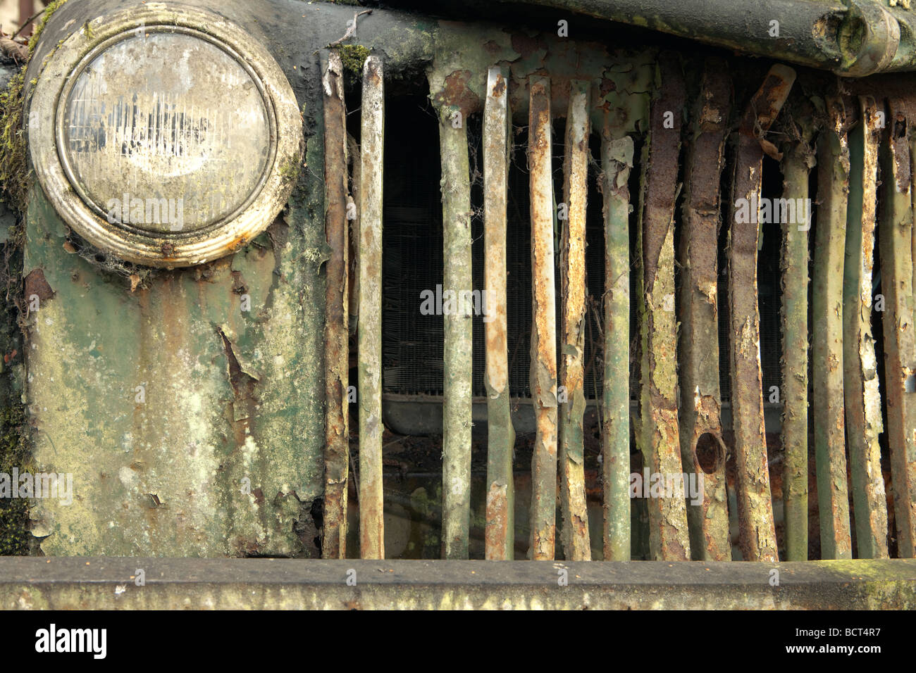 The exterior radiator grill from a old abandoned and broken down truck that has rusted out from top to bottom Stock Photo Alamy