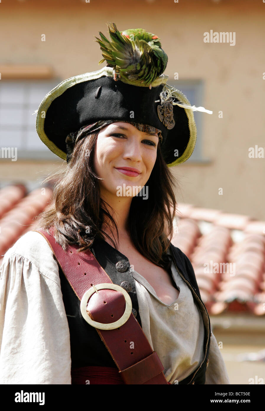 Female pirate with a parrot on her hat Stock Photo