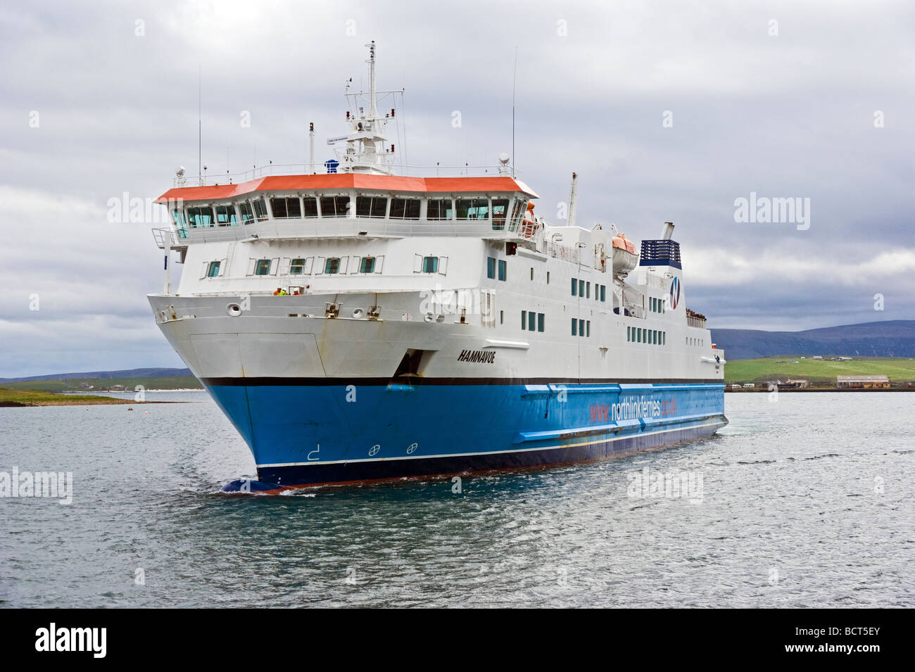 North Link Ferries car ferry m.s. Hamnavoe approaches Stromness pier on conclusion of its journey from Scrabster Stock Photo