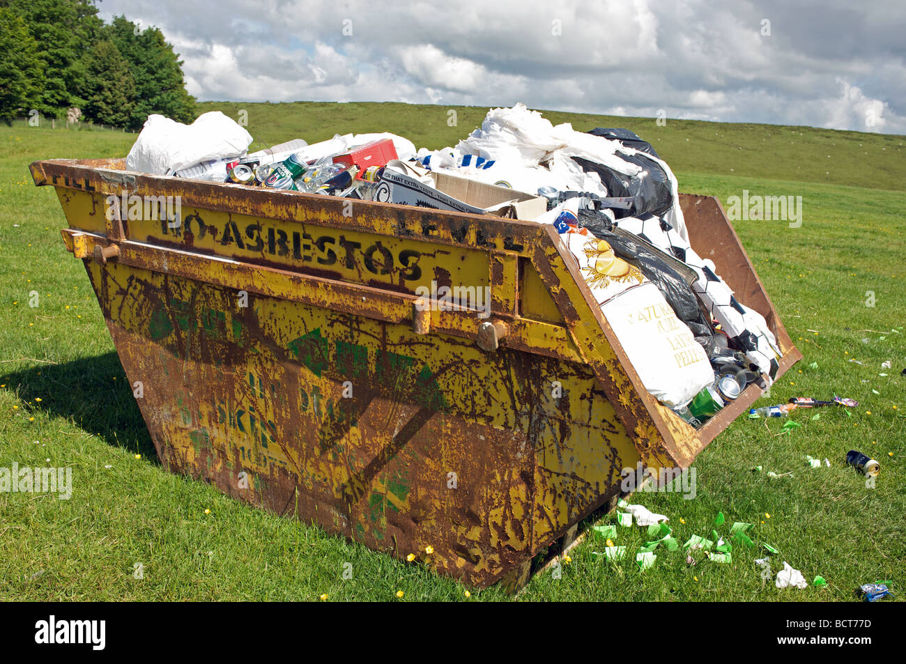 Skip full of rubbish in the English countryside Stock Photo Alamy