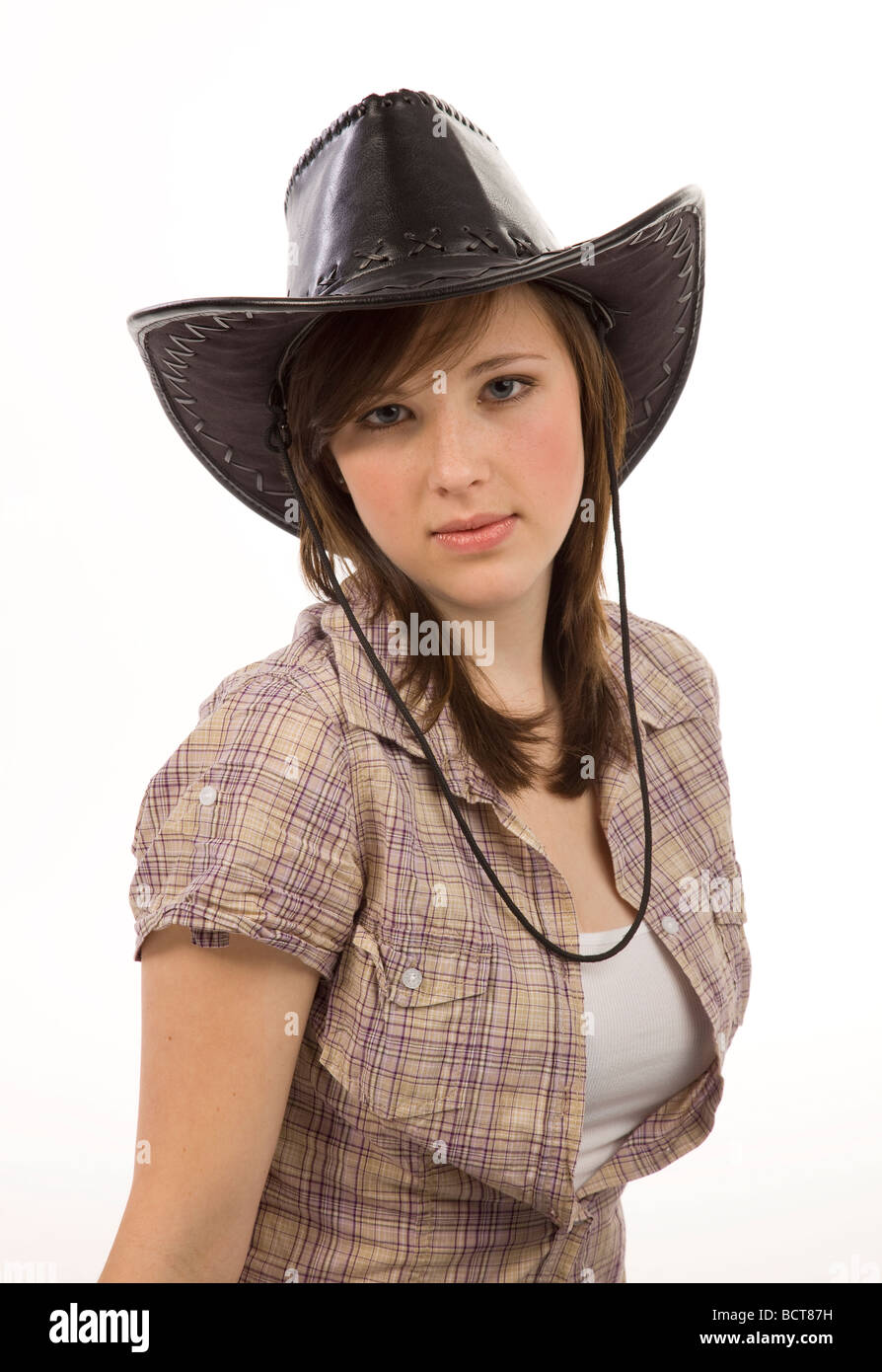 Young woman dressed casually with a cowboy hat Stock Photo Alamy