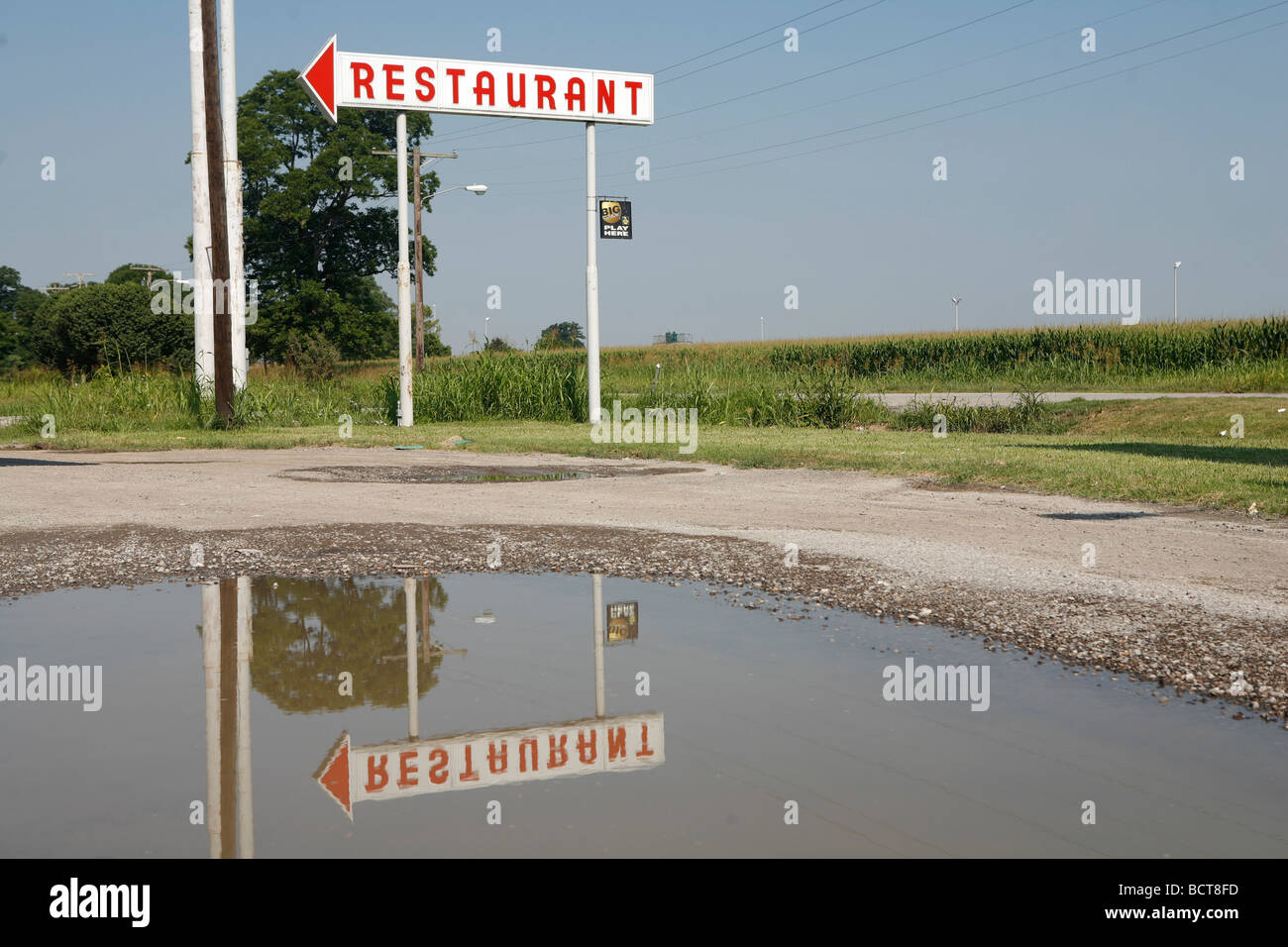 A vintage restaurant sign marks the spot of a gas station and diner outside Cairo Illinois Stock Photo