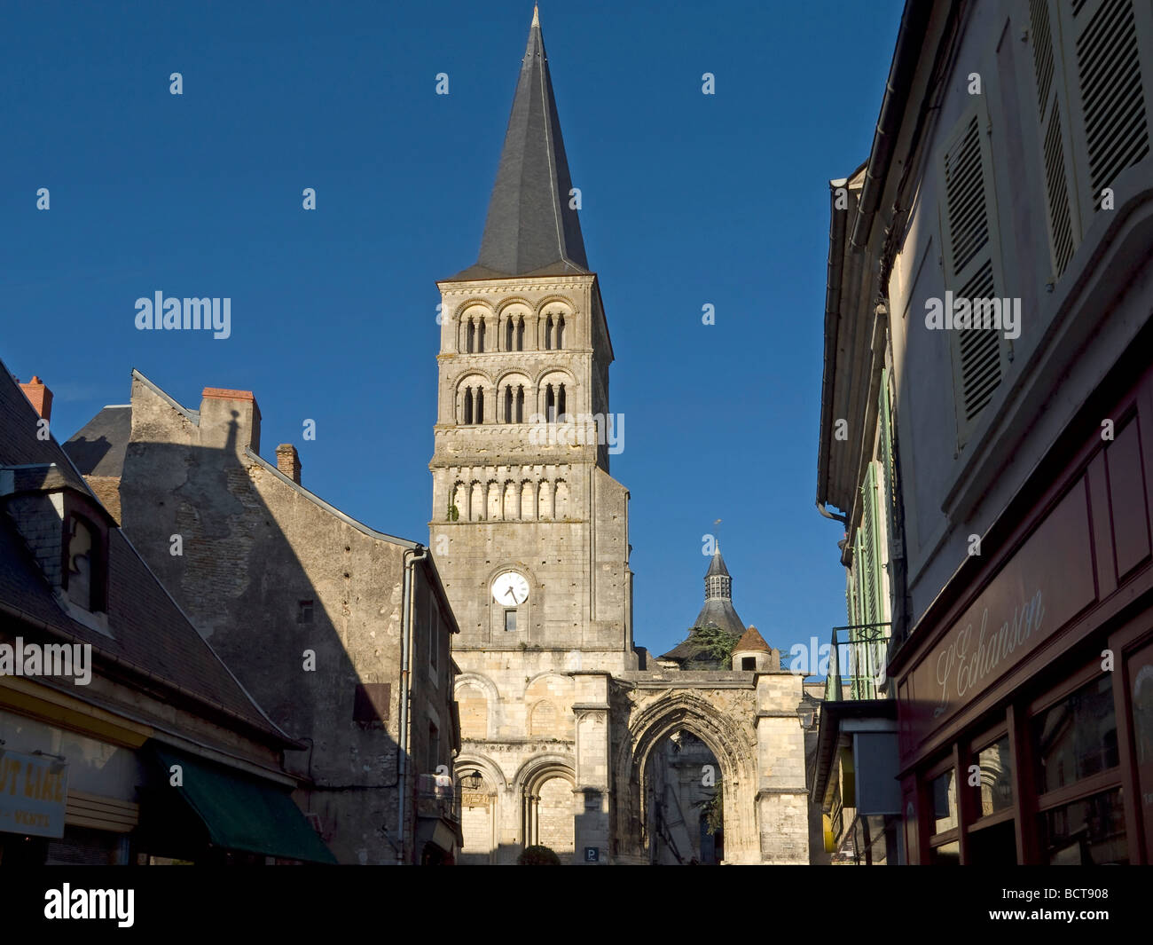 church Notre Dame with steeple and clock in La Charite sur Loire Stock Photo
