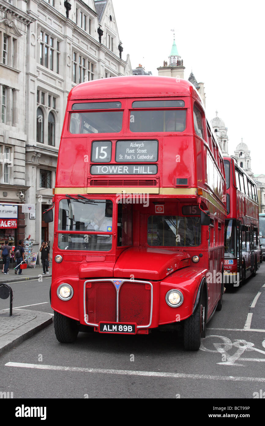 A red London Routemaster bus on a London street. Stock Photo