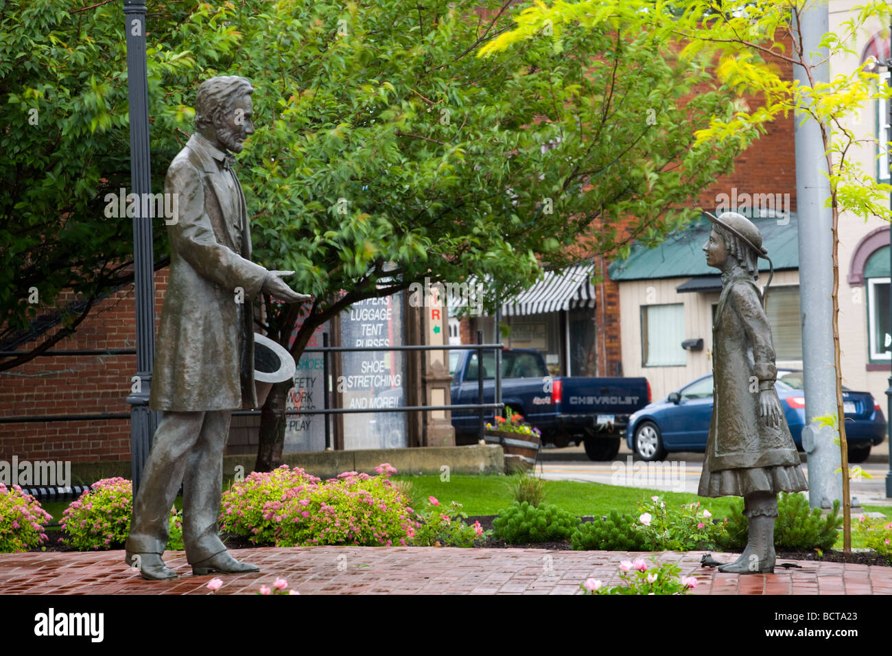 Bronze statues commemorate Abraham Lincoln thanking young girl Grace Bedell for advice to grow beard Westfield New York Stock Photo