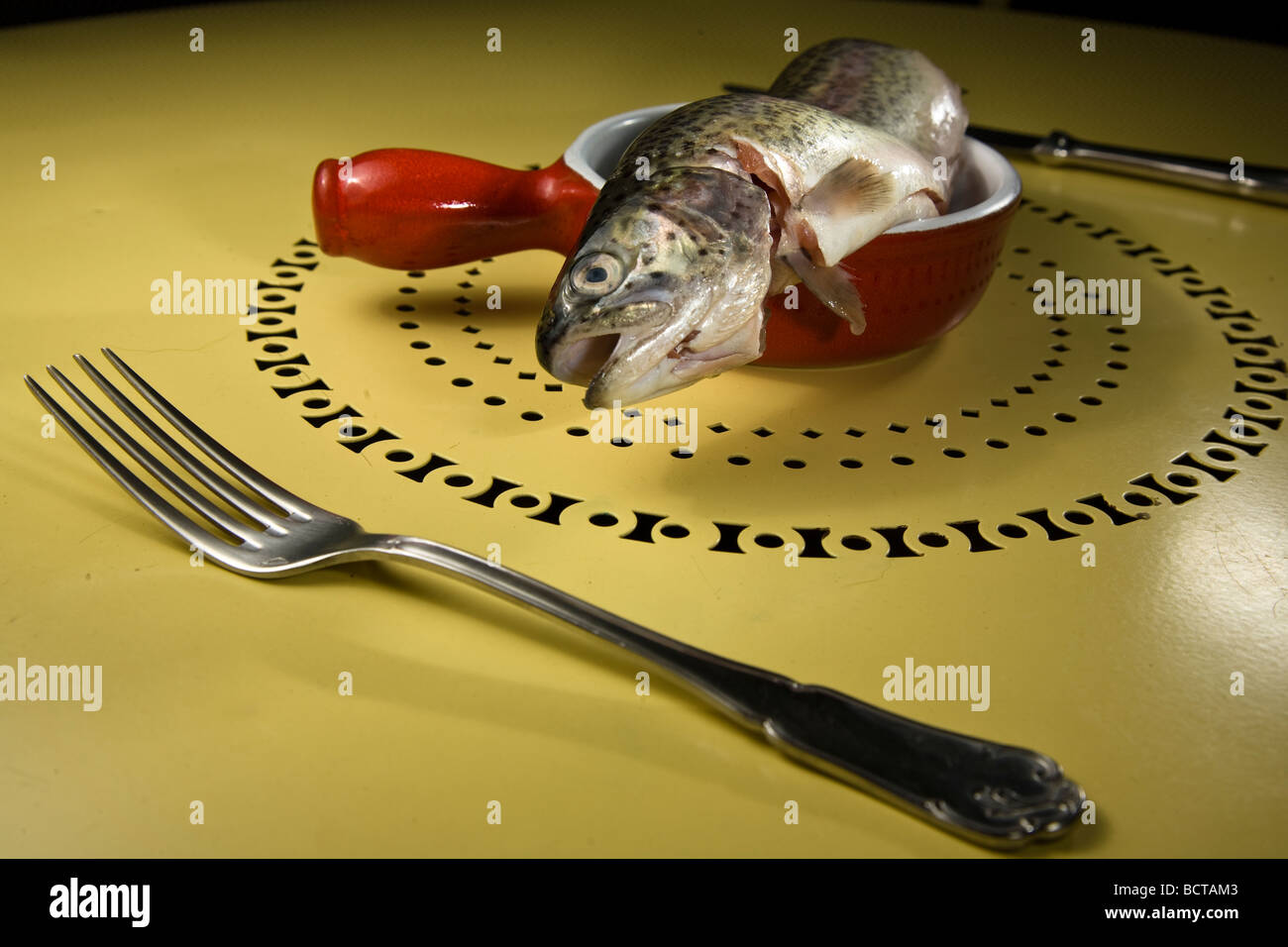 Fresh Fish in a small dishes placed as a symbol Stock Photo Alamy