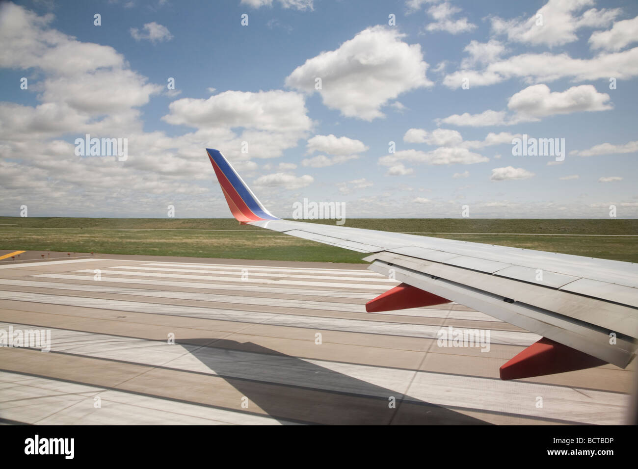 Aerial View from a Southwest Airlines Airlpane Taking Off from Denver International Airport Overlooking Runway Stock Photo