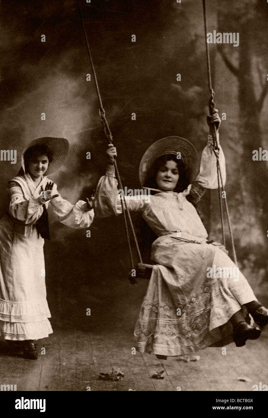Girls on swings, historical photo around 1908 Stock Photo Alamy