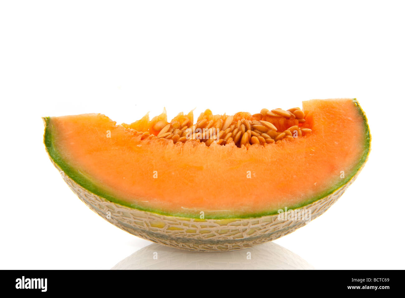 slice of Fresh sweet tasty melon isolated over white Stock Photo