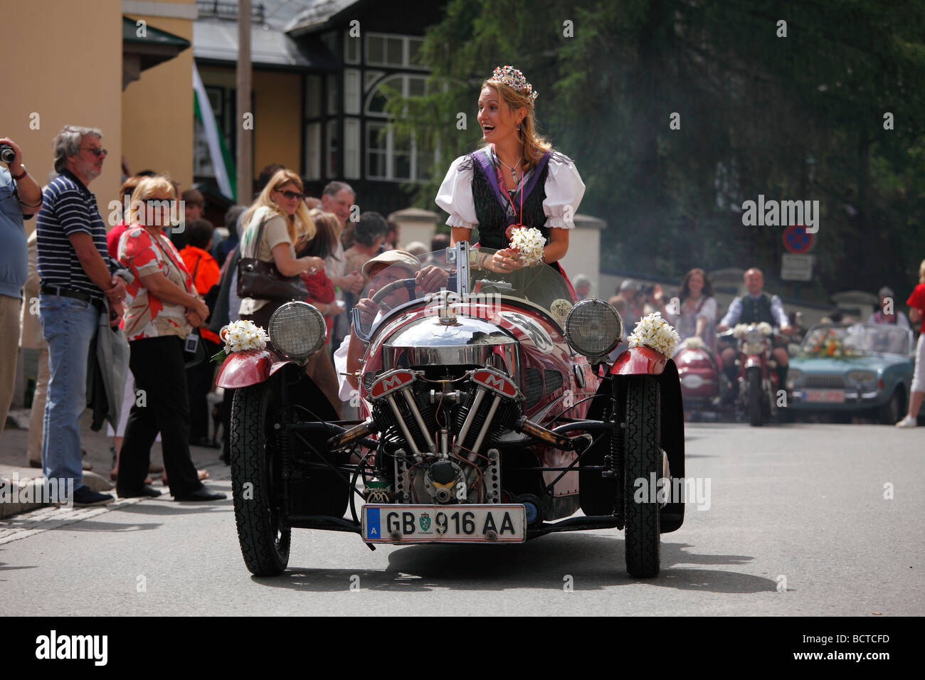 Classic car decorated with daffodils, Narzissenfest Narcissus Festival in Bad Aussee, Ausseer Land, Salzkammergut area, Styria, Stock Photo