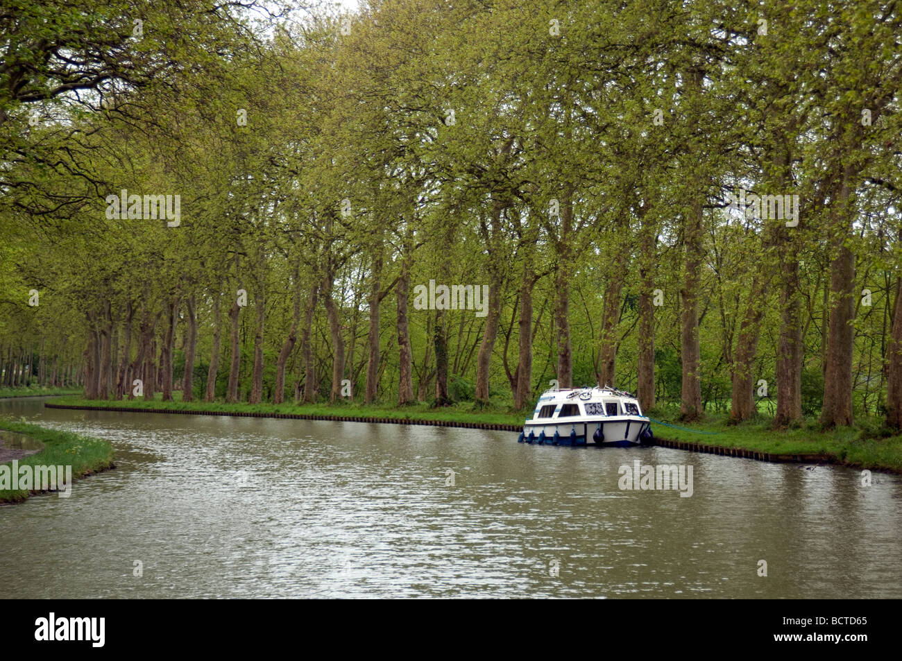 Boat in Canal Stock Photo