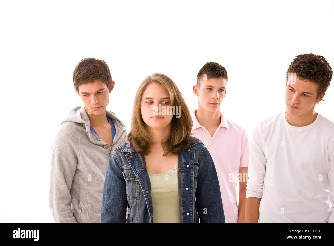 Portrait of a group, three boys and a girl Stock Photo - Alamy