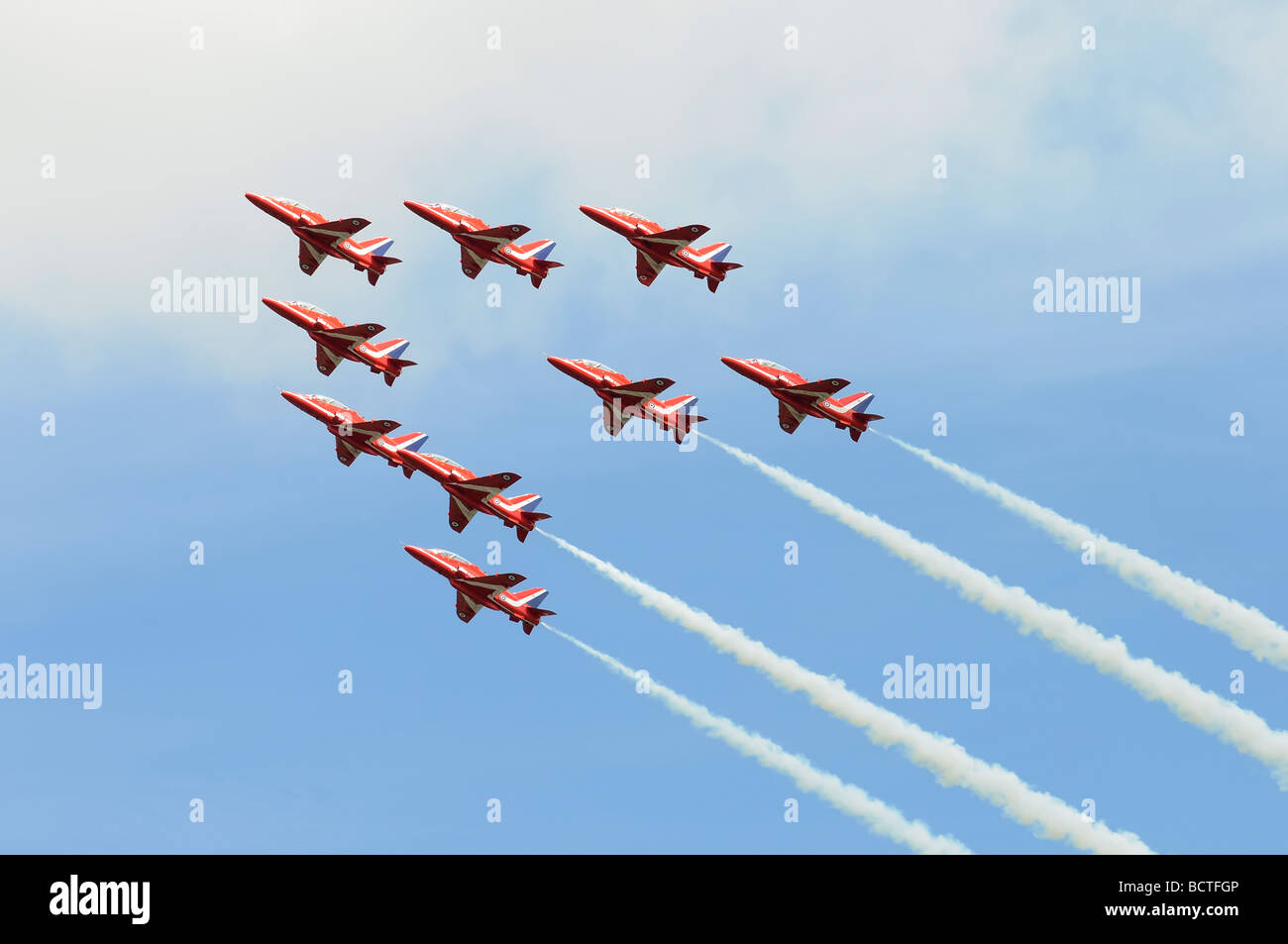 The Royal Air Force Red Arrows aerobatic display team in perfect formation at the 2009 Royal International Air Tattoo RAF Fairfo Stock Photo