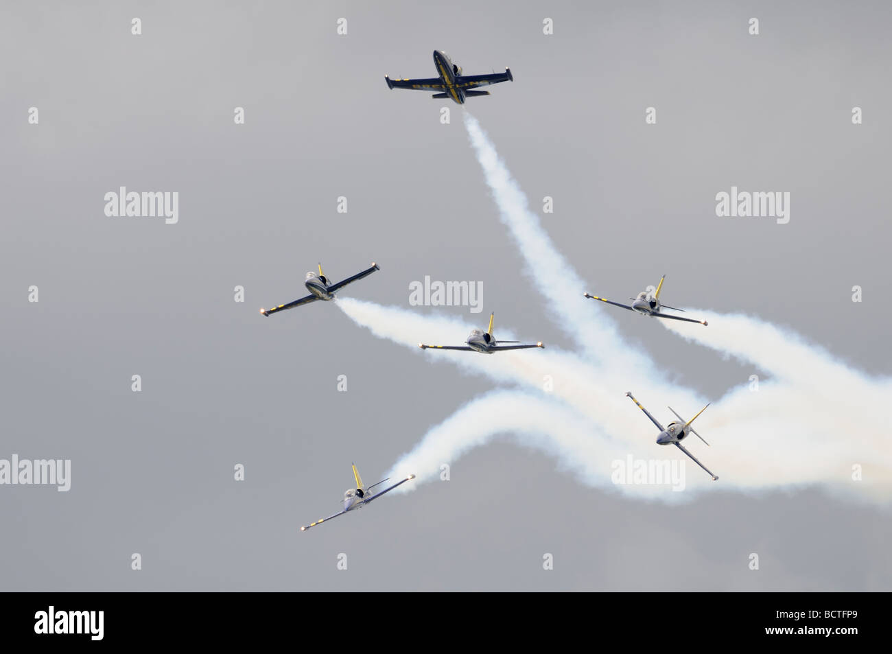 The Breitling Jet Team  civilian aerobatic display team using jet aircraft start their final maneuver or eclatement final Stock Photo