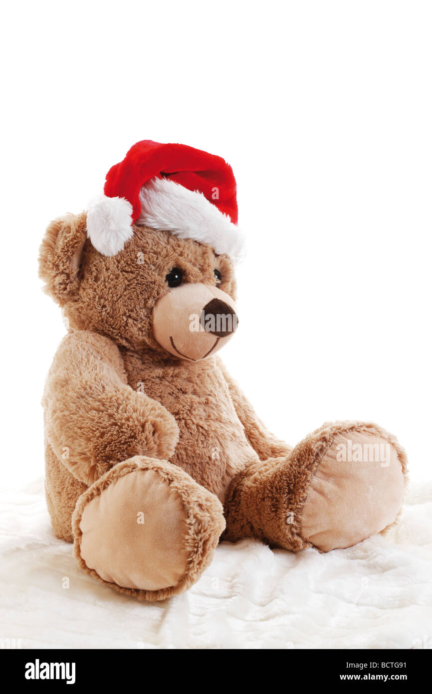 Teddy bear with Christmas hat Stock Photo - Alamy