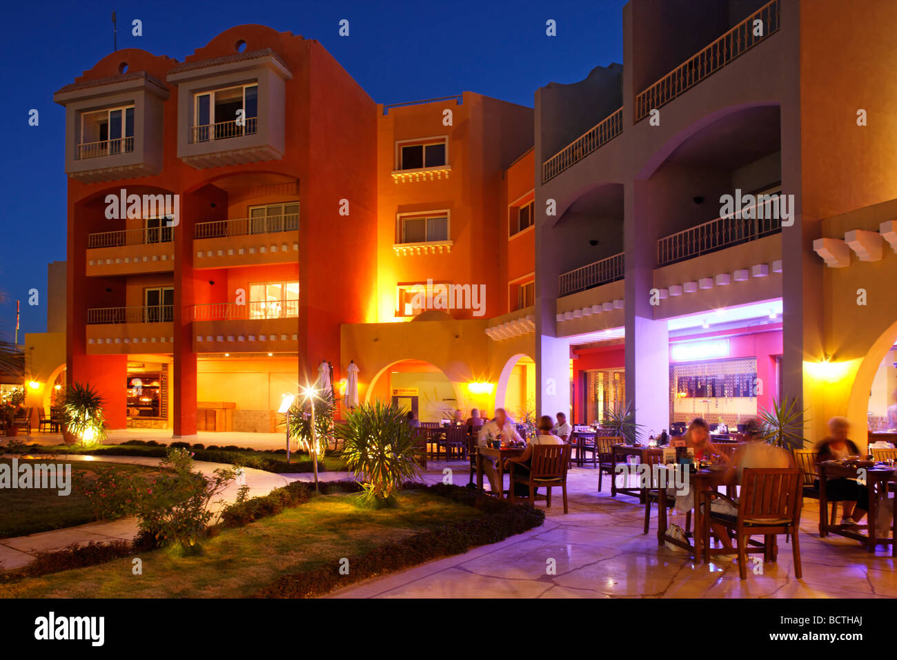 Street restaurant with people, evening, illuminated, marina, Hurghada, Egypt, Red Sea, Africa Stock Photo