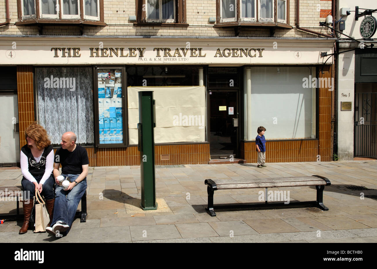 Closed for business a Henley on Thames travel agency shopfront in