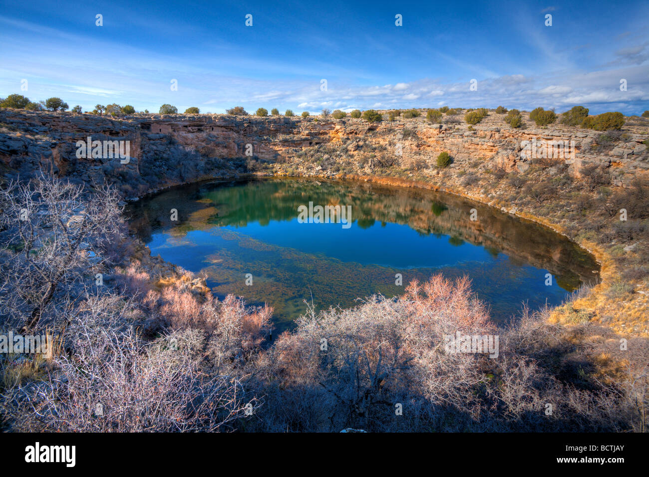 Montezuma well water filled sinkhole in Arizona high desert HDR image Stock Photo