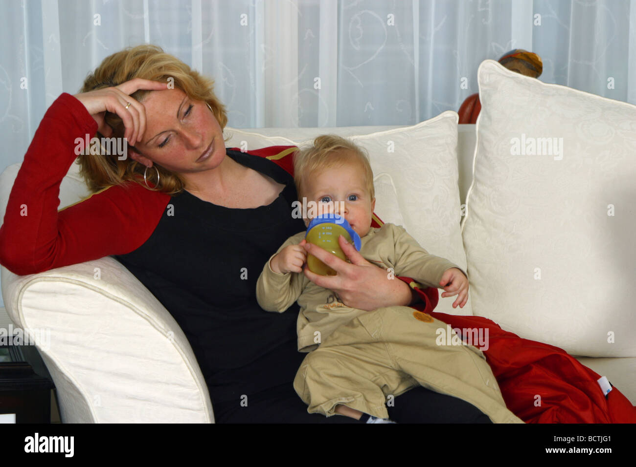 Housewife tired exhausted or postnatal depression , depressed mum ,  - SerieCVS217080 Stock Photo