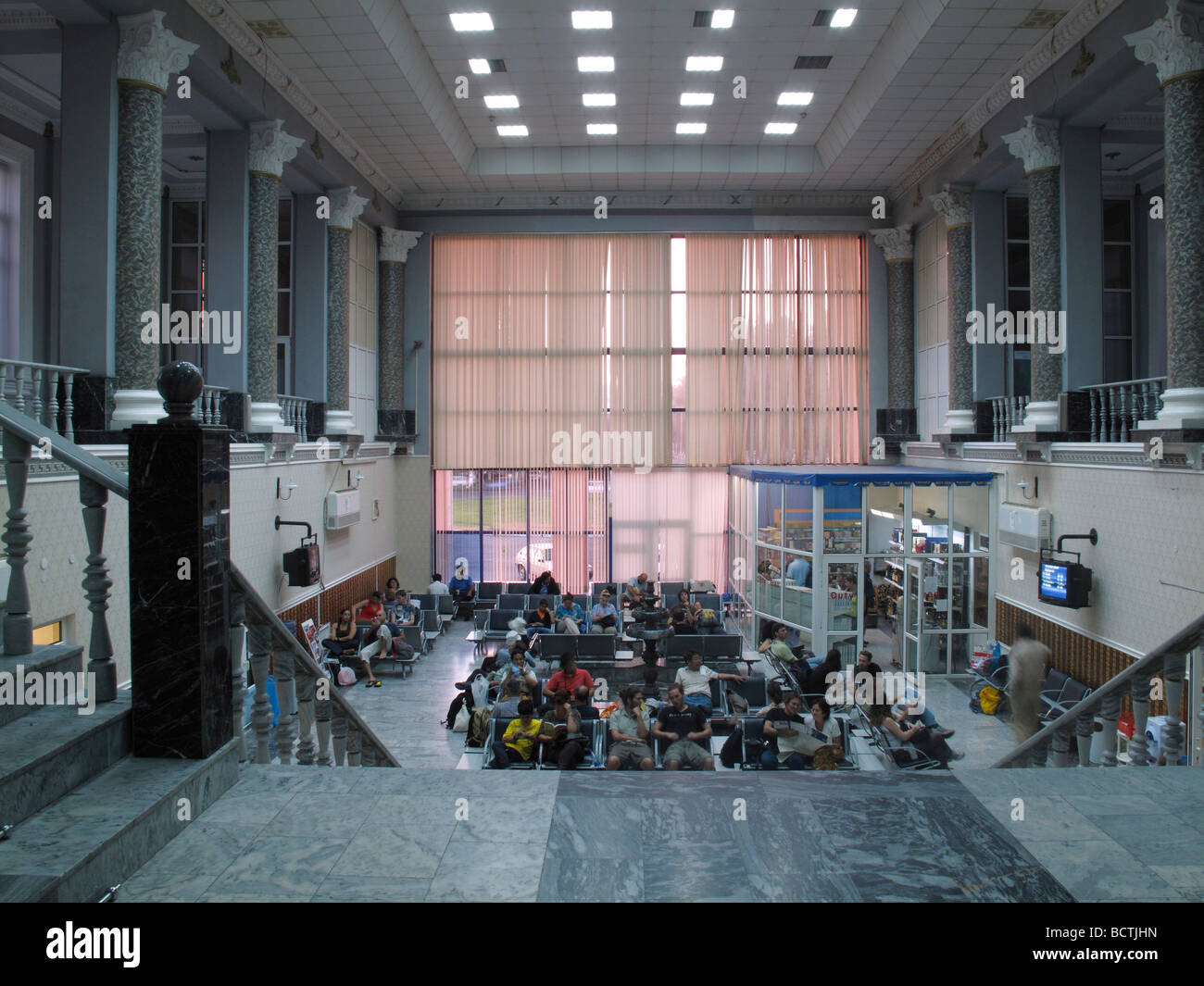 Passengers wait for their flight at the Transit Departure hall in Tashkent International Airport terminal Uzbekistan Central Asia Stock Photo