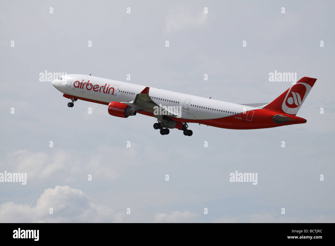 Air Berlin plane taking off into a cloudy sky Stock Photo Alamy