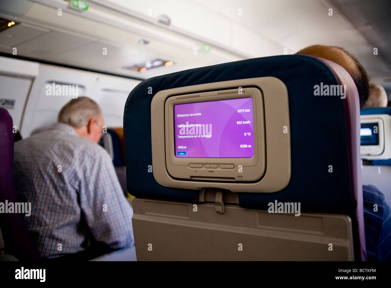 Personal video monitor on back of coach class seat of Delta Airlines plane.  MR ©Myrleen Pearson Stock Photo - Alamy
